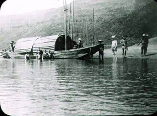Junk with trackers, group of missionaries in the water beside the boat Credit: Best Family.