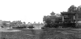 View of a river with fishing boats, pagoda, [undated] Credit: Kilborn / Walmsley Family.