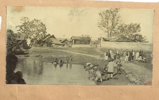 Washing in the river Credit: Bowles Family  / David Rutherford.