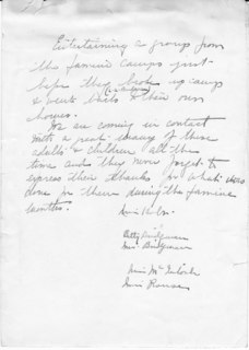 Entertaining a group from the famine camp just before they broke up camp & went back (C.A. Bridgman) to their own chores.(back of photo) Credit: Bridgman Family.